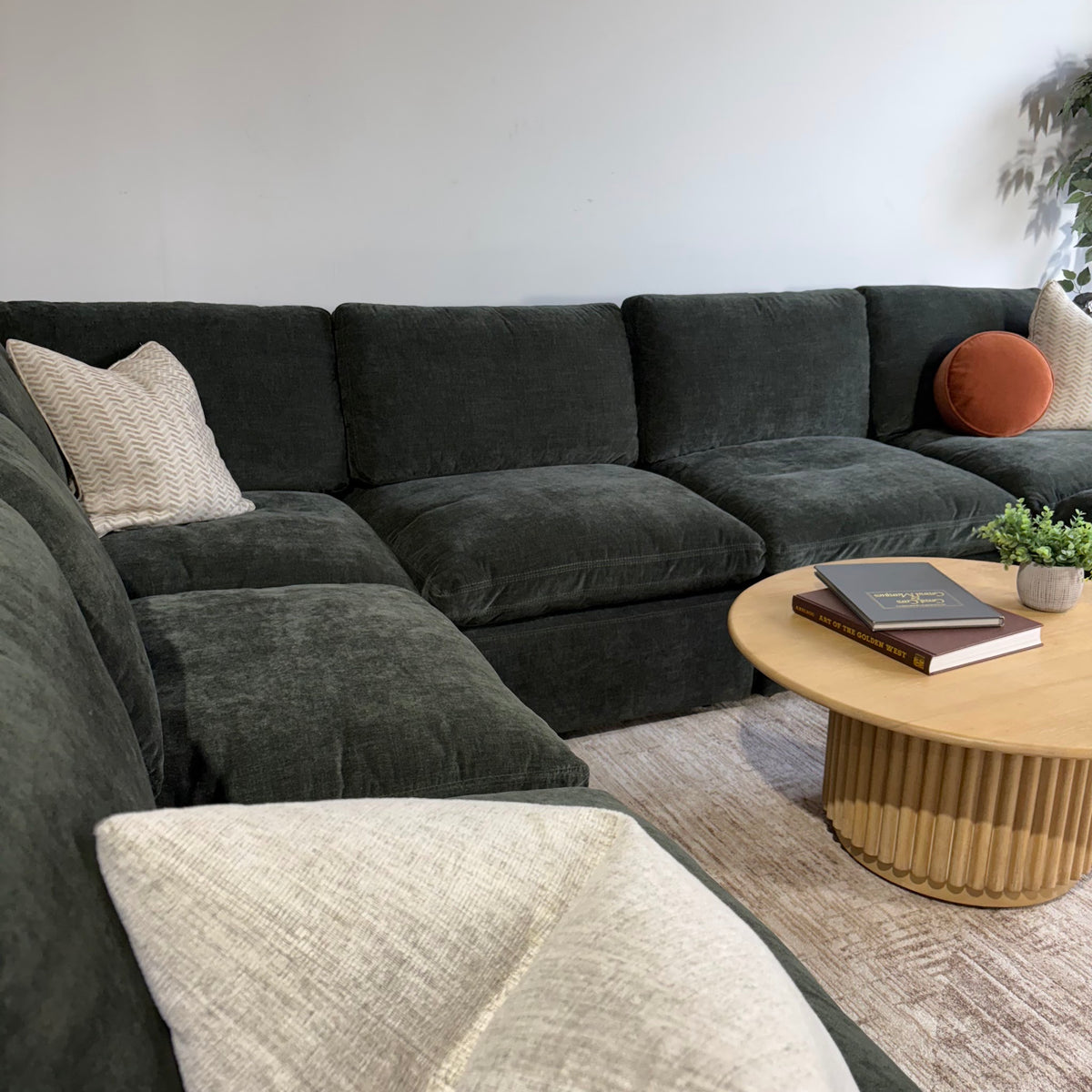 Cypress Grand Corner + Ottoman in Velvet Forest Green, left close-up