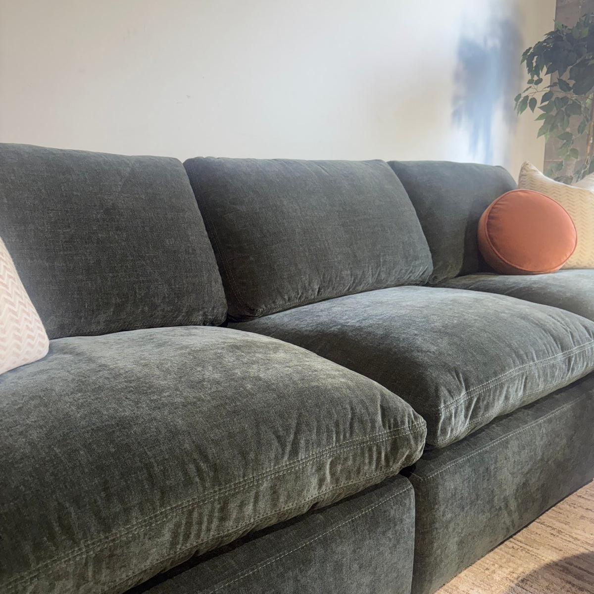 Cypress Sofa + Ottoman in Velvet Forest Green, left close-up