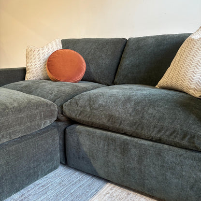 Cypress Loveseat + Ottoman in Velvet Forest Green, right close-up