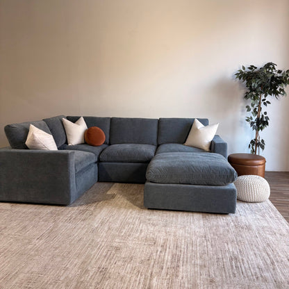 Cypress L-Shape Enclosed + Ottoman in Velvet Opal Blue, angled view