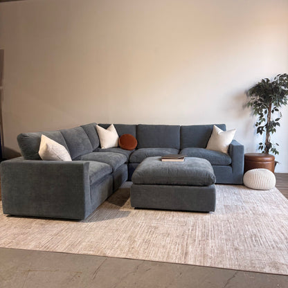 Cypress Corner Sectional + Ottoman in Velvet Opal Blue, angled view