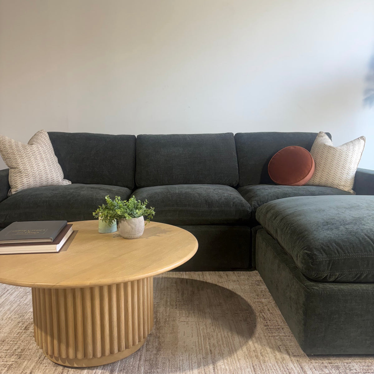 Cypress Sofa + Ottoman in Velvet Forest Green, front close-up