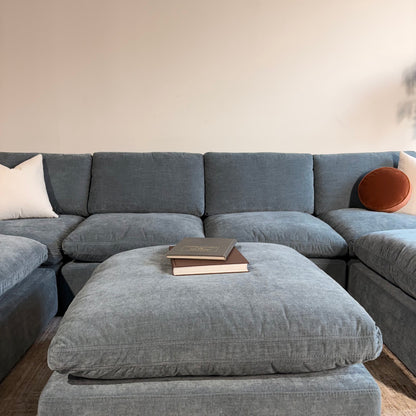 Cypress Grand Corner + 2 Ottomans in Velvet Opal Blue, front close-up