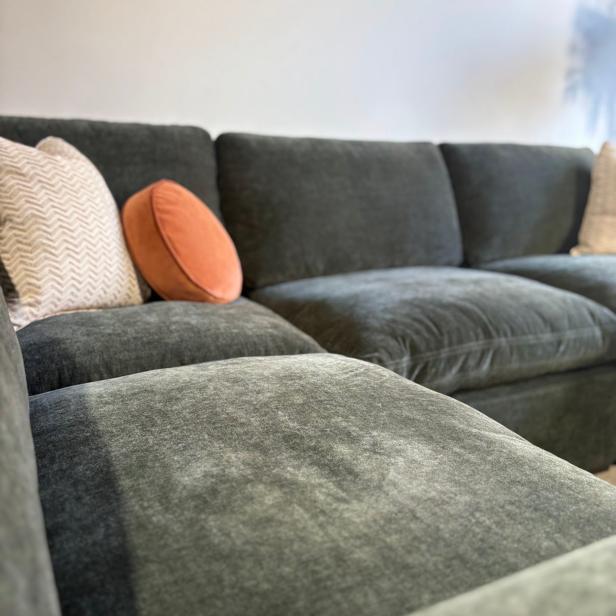 Cypress L-Shape Enclosed + Ottoman in Velvet Forest Green, left close-up