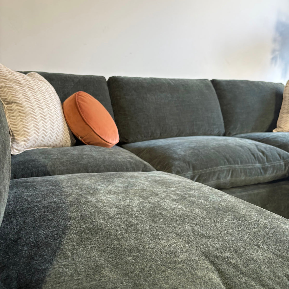 Cypress L-Shape + Ottoman in Velvet Forest Green, left close-up