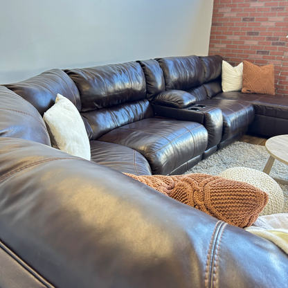 Ashleys Leather Reclining sectional in Brown