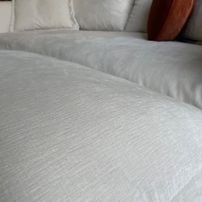 Interior Define Skylar Sofa + Ottoman in Cream Performance Vintage Velvet