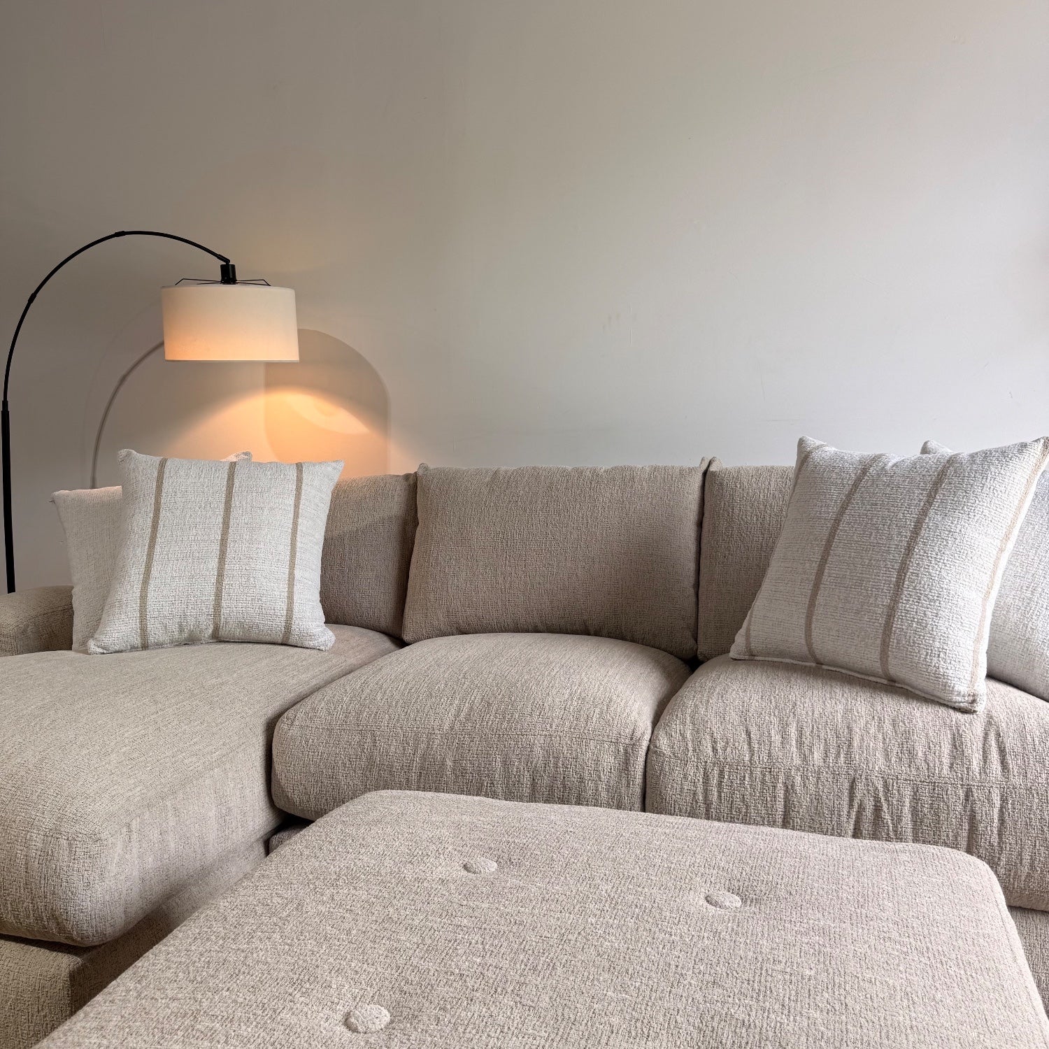Parker Left Chaise Sectional + Ottoman in Beige Chenille — Kindred Couches