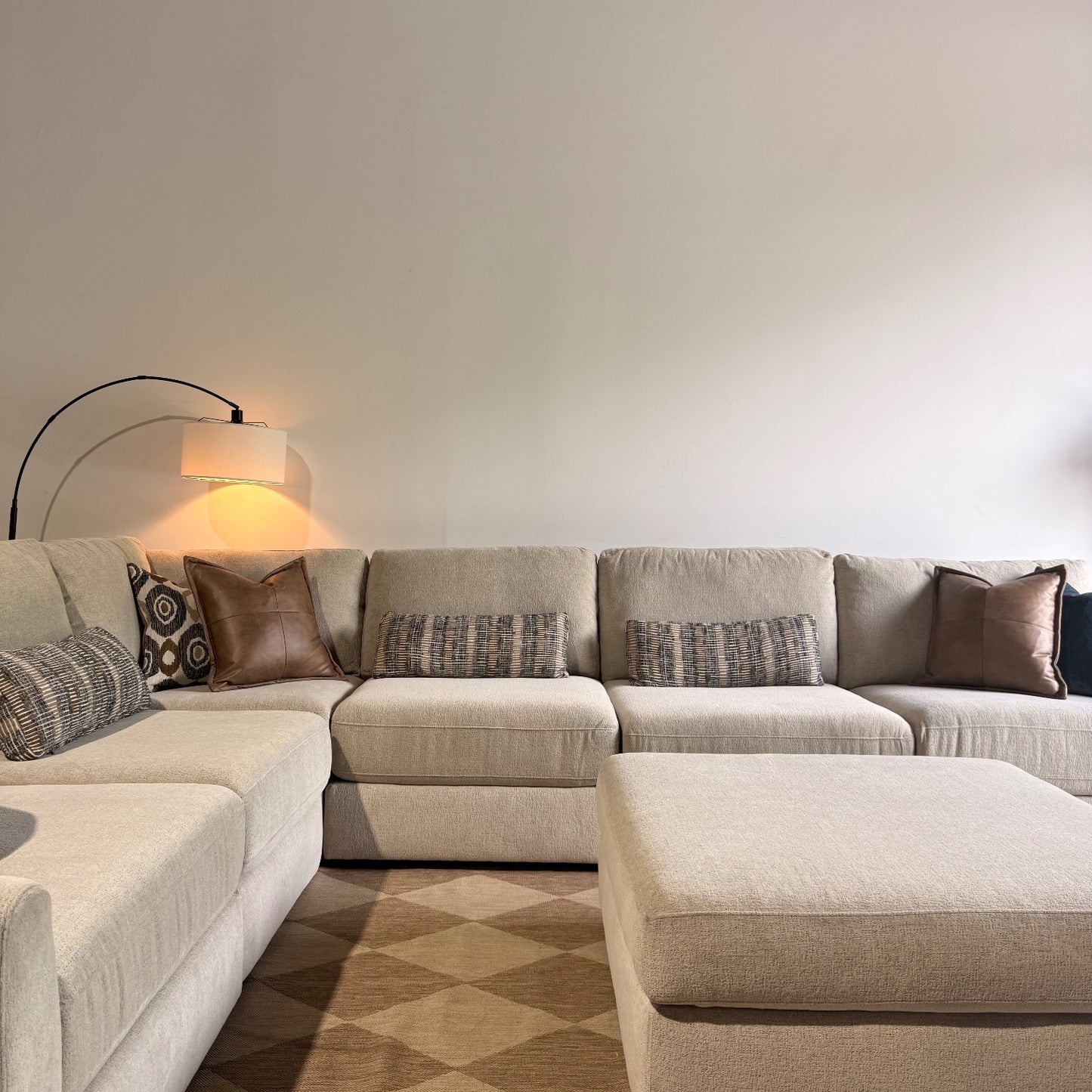 Oak Grand Corner Sectional + Ottoman in Beige Performance Fabric