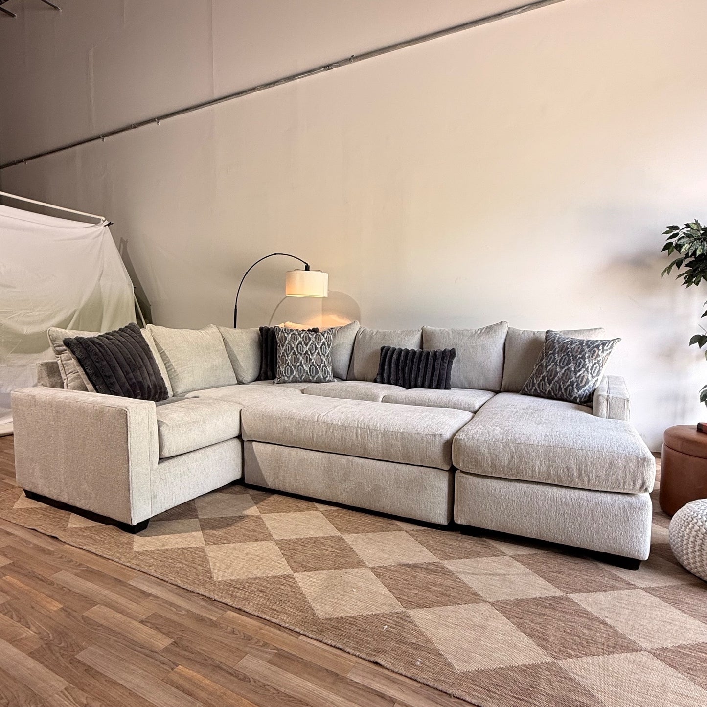 Carter Sectional + Ottoman in Beige Fabric